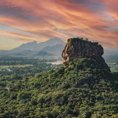 Spectacular view of the Lion rock surrounded by green rich vegetation. Picture taken from Pidurangala Rock in Sigiriya, Sri Lanka.